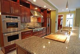 Granite new venetian gold white cabinets stainless steel gas oven i.pinimg.com. New Venetian Gold Granite Countertops Elegance Gold Granite