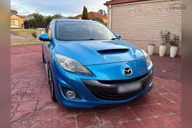 Image result for Electric Blue 2007 Mazda3