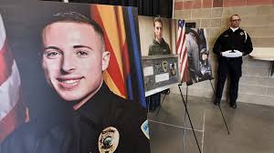 Hundreds gather at MetraPark for public casket viewing of Officer Joshua  Briese