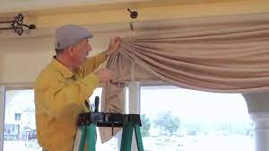 Hold the left edge of the fabrics at the top where you want the swag's left end to appear. Video 41 Tips From Us Swag Curtains How To Hold Swag Curtains In Place Youtube