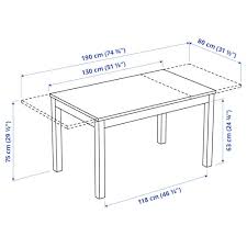 Made of wood, veneer and engineered wood with a rich dark brown finish and diamond matched veneer inlay tabletop Laneberg Extendable Table Brown Ikea