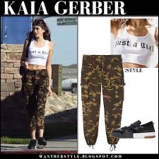 Black And White Camo Cargo Pants Kaia Gerber In White Crop Top Camo Cargo Pants And Black Sneakers Celebrity Outfits White Crop Top Grammy Outfits