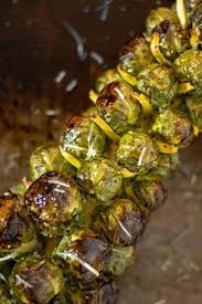 Sheet Pan Roasted Brussel Sprouts Stalk In The Oven Ww 4 Points Vegan Vegetarian Keto Paleo Gluten Free Recipe Roasted Brussel Sprouts Pan Roasted Brussel Sprouts Vegetarian Recipes Easy Dinner