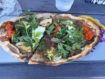 Wood-fired Balkan pide flatbread, AI generated