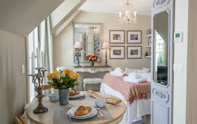 Parisian style living rooms tend to take one of two different approaches: Small Space Parisian Style How To Decorate A Studio Apartment Paris Perfect