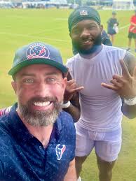 Cowboys autograph week 7 and new era hat