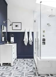 Rolled and hung towels reinforce the exquisite color scheme of this bathroom. Where To Hang Your Bathroom Towels Our New Favorite Solution Emily Henderson