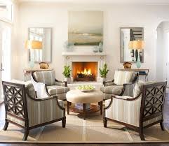 The lovely gold colors in this room add an elegant ambiance to the room. 101 Beautiful Living Rooms With Fireplaces Of All Types Photos Fireplace Seating Traditional Living Room Furniture Living Room With Fireplace