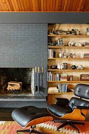 Brick fireplace in mid mod. 14 Photos Of A Flawlessly Cool Mid Century Modern Home Mid Century Modern Living Room Mid Century Modern Interiors Mid Century Modern Living