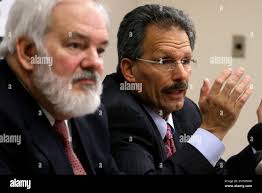 Attorneys for retired Pittsburgh Police Chief Nate Harper, Robert Leight,  left, and Robert Del Greco Jr., talk with the media after Harper was  indicted by a federal grand jury in Pittsburgh on