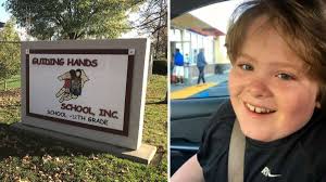 US News Three people charged over death of restrained autistic boy