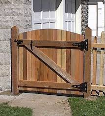Check out these 21 diy driveway gates plans to find the one that's right to secure your property. How To Build A Wooden Gate Professionally Hunker Wood Gate Wooden Gates Building A Wooden Gate