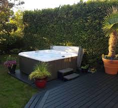 Adding a jacuzzi area to your backyard creates an amazing outdoor chillout spot. Ace Swim Leisure Hot Tubs Pools Backyard Leisure