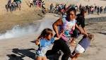 border forces fire tear migrant