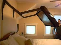 When You Re Not Actually Watching Television Or Using Your Tv At All Your Tv Can Be Quite The Eyesore It S Basicall Wall Mounted Tv Hidden Tv Mount Hidden Tv