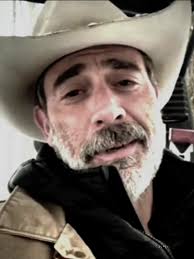 Him with a cowboy hat