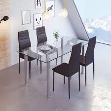 So we purchased a glass dining table second hand to use the glass only and use those clear bumpers under. Dining Table And 4 Chairs Tempered Glass Dining Table And 4 Black Faux Leather Padded Chairs Kitchen Dining Table Set Buy Online In Dominica At Dominica Desertcart Com Productid 136574628