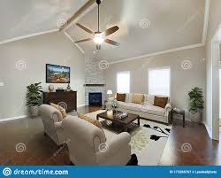 They can be steep or subtle. Furnished Living Room With Vaulted Ceiling Stock Image Image Of Fireplace Idea 173288767