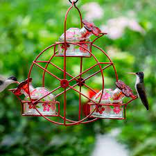 A hummingbird feeder can attract these adorable birds to your garden, so you can watch. Ferris Wheel Hummingbird Feeder Glass Hummingbird Feeders Uncommon Goods