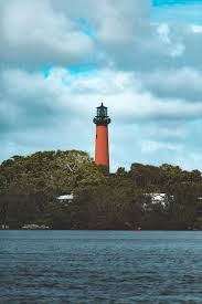 Lighthouse park (lot 20) was patented to the town of jupiter by the secretary of the interior in october 2004 after six years under a recreation and public purpose act lease, and has been completely renovated with new ball fields and parking facilities and continues to host active athletic programs. Hd Wallpaper Jupiter United States Jupiter Lighthouse Park Boat Vacation Wallpaper Flare