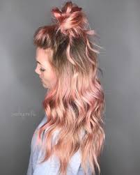 A half up half down bun will both show off your long locks and make you feel comfortable with them. 20 Ideas How To Spice Up Your Half Bun