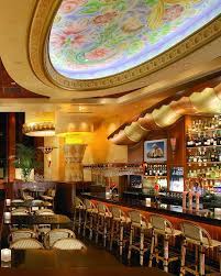 Place the dark chocolate in a decorating bottle and squeeze fine lines over the entire cake surface. Cheesecake Factory Interiors Are Weird And Wonderful All Thanks To This Designer Eater