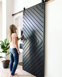 Build A Modern Barn Door Like Joanna Gaines Modern Sliding Barn Door Modern Barn Door Barn Door Designs