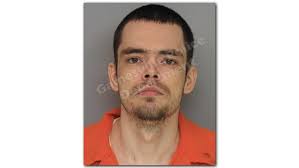 Police: Masked robber stabs CVS employee in head