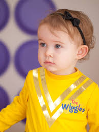 Yellow and purple wiggle (Yellow Wiggle Emma Watkins engaged to Oliver Brian  Herald Sun)