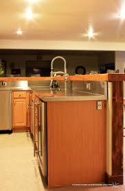 The use of wood all throughout the whole set, established the rustic feel of the bar. A Rustic Basement Bar
