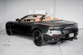 Image result for Marron Black 2021 Aston Martin