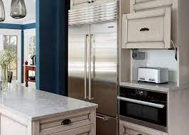 How are side by side appliance garages work? A Dream Kitchen With Appliance Garage Hiding The Toaster With Integral Steam Oven Below Kitchendesign Kitche Integrated Refrigerator Steam Oven Refrigerator
