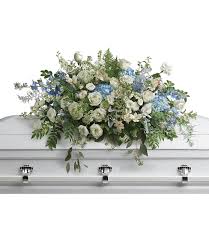 We source only the best fresh flowers on a daily basis. White Blue Casket Flowers League City Funeral Delivery