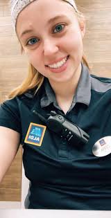 Aldi stockers work hard to stock shelves by 9am