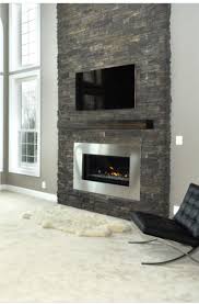 Faux stone panels promise the look of stone without the labor or expense involved with real stone. 41 Stacked Stone Fireplace Ideas Sebring Design Build