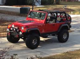 Image result for Flame Red 2005 Jeep