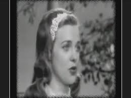 Chet Atkins and Eddy Arnold listen to the playback of a just-recorded track  at RCA Studio B in Nashville.