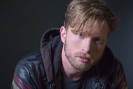 Meet the cast of Puffs opening August 8! Kerry Kazmierowicztrimm (he/they)  is an award-winning actor and writer and playing the role of Oliver Rivers.  They recently returned from Chicago, where they starred