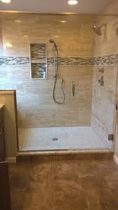 Our New Large Master Bath Shower Window And Bench Are To The Left We Used Natural Stone Tile A Ubtle Gre Shower Remodel Master Bath Shower Bathrooms Remodel