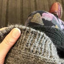 Have a knitting machine and don't know how to use it? Roving Reporter Finishing A Sweater Knitted With Handspun Yarn Spin Off