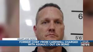 Former chief from Cardwell charged with assault; out