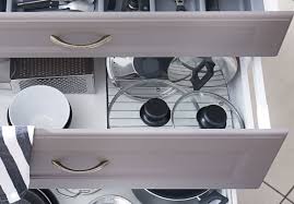 Stack smaller glass dishes inside of larger ones. How To Store Everything In The Kitchen