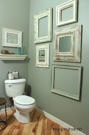 Small Bathroom Makeover Blue Green Walls I Really Like The Frames On The Wall It Doesn T Mak Small Bathroom Makeover Bathroom Wall Decor Small Bathroom Decor