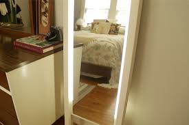 How To Make Cute Lighted Leaning Mirror The house we're renting at the moment has a very poorly lit the idea was to use a picture frame, hanging from the top edge of the mirror, and filled with leds. how to make cute lighted leaning mirror