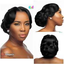 Due to the addition of two thick twists down the crown, the standard halo braid updo gets an upgrade here. Black Wedding Updo Hairstyles For Long Hair Addicfashion