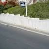 Weep holes are installed in a masonry wall inside the wall cavity and above grade. 1