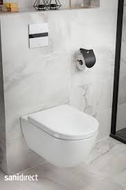 hotel chique toilet combineer een witte keramieke toilet met zwarte accesoires en marmerlook badkamer marmeren tegels badkamer marmer