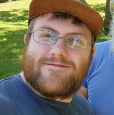 Behold! Me standing next to my whip, getting ready to drive all over town  this holiday season. Not sure how Santa manages the whole world in one  night — delivering gifts in