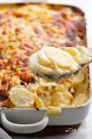 Garlic Parmesan Scalloped Potatoes Layered In A Creamy Garlic Sauce With Parmesan And Mozzarella Is The Best Side Dish To Any M Recipes Food Scalloped Potatoes