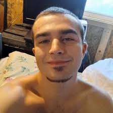 Lost black cat near east side school